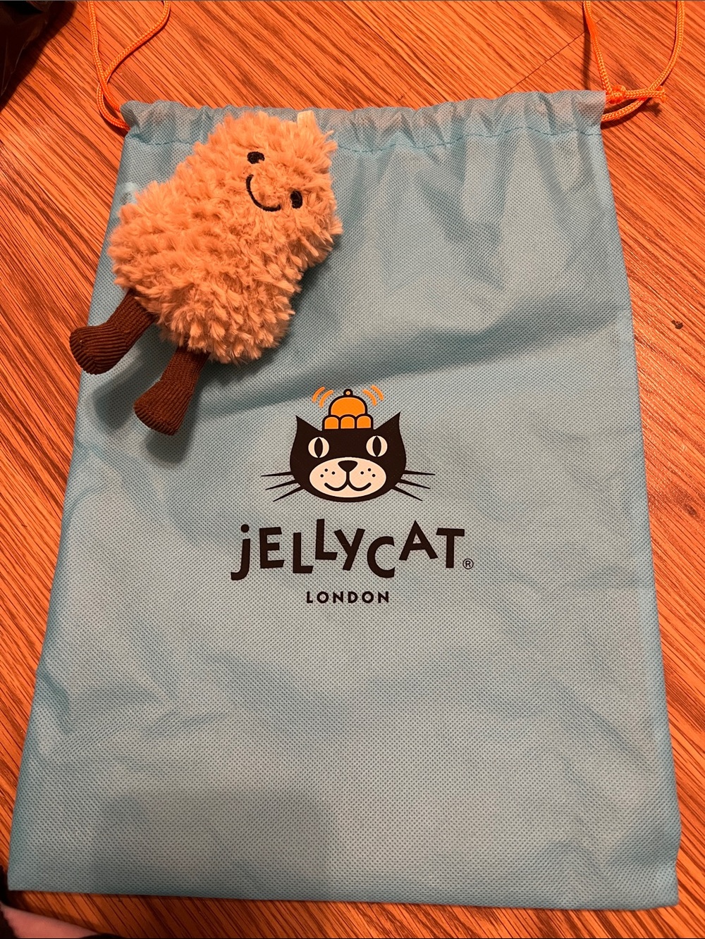 Not Jellycat Blue Drawstring Bag with Plush peanut
